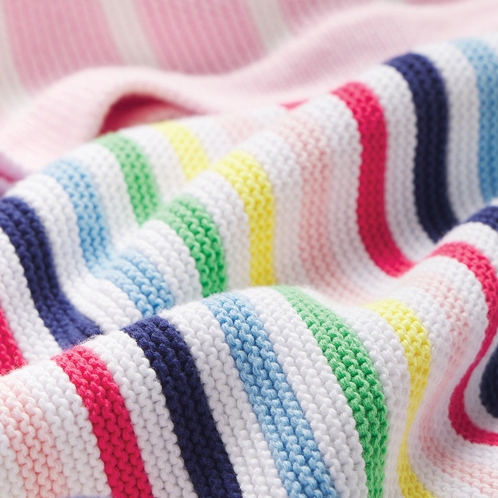 Upclose image of rainbow striped blanket