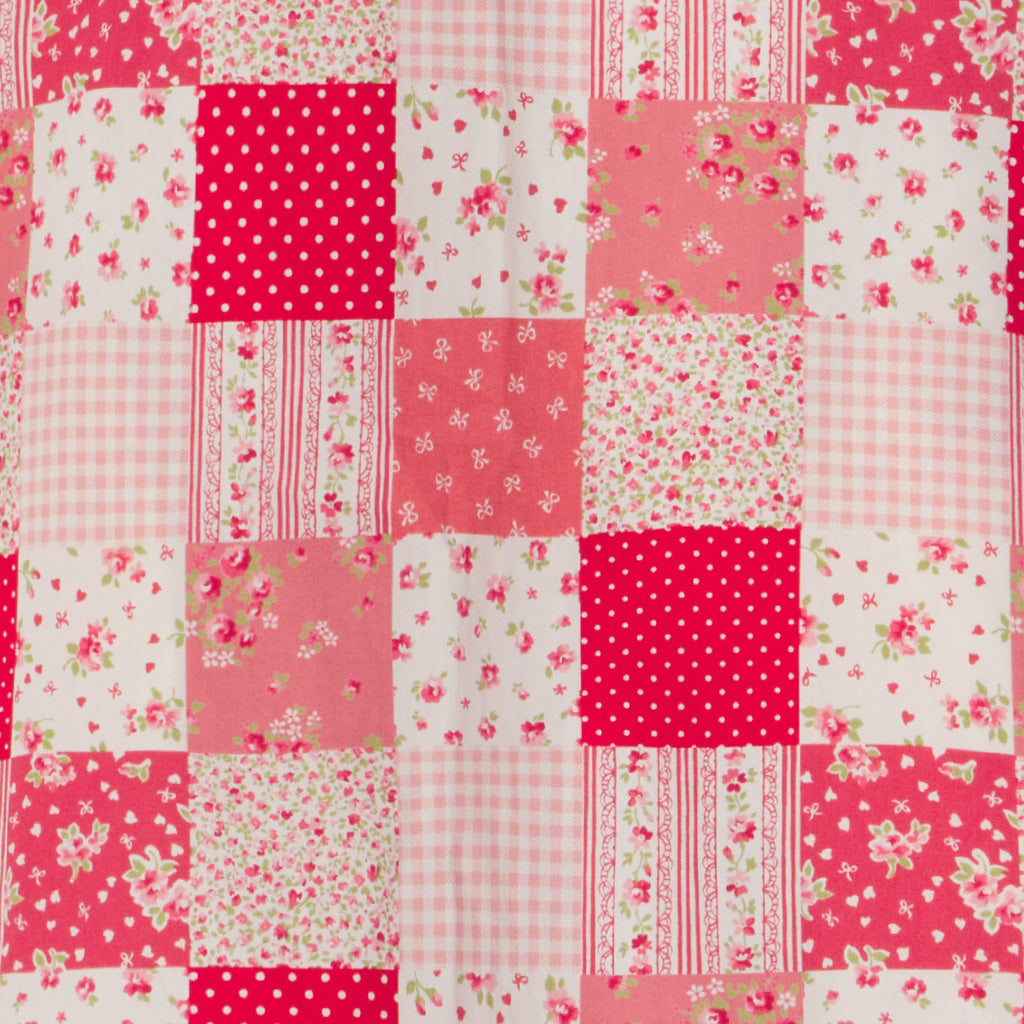 beautiful patchwork fabric image in red white and pink. our love patchwork fabric